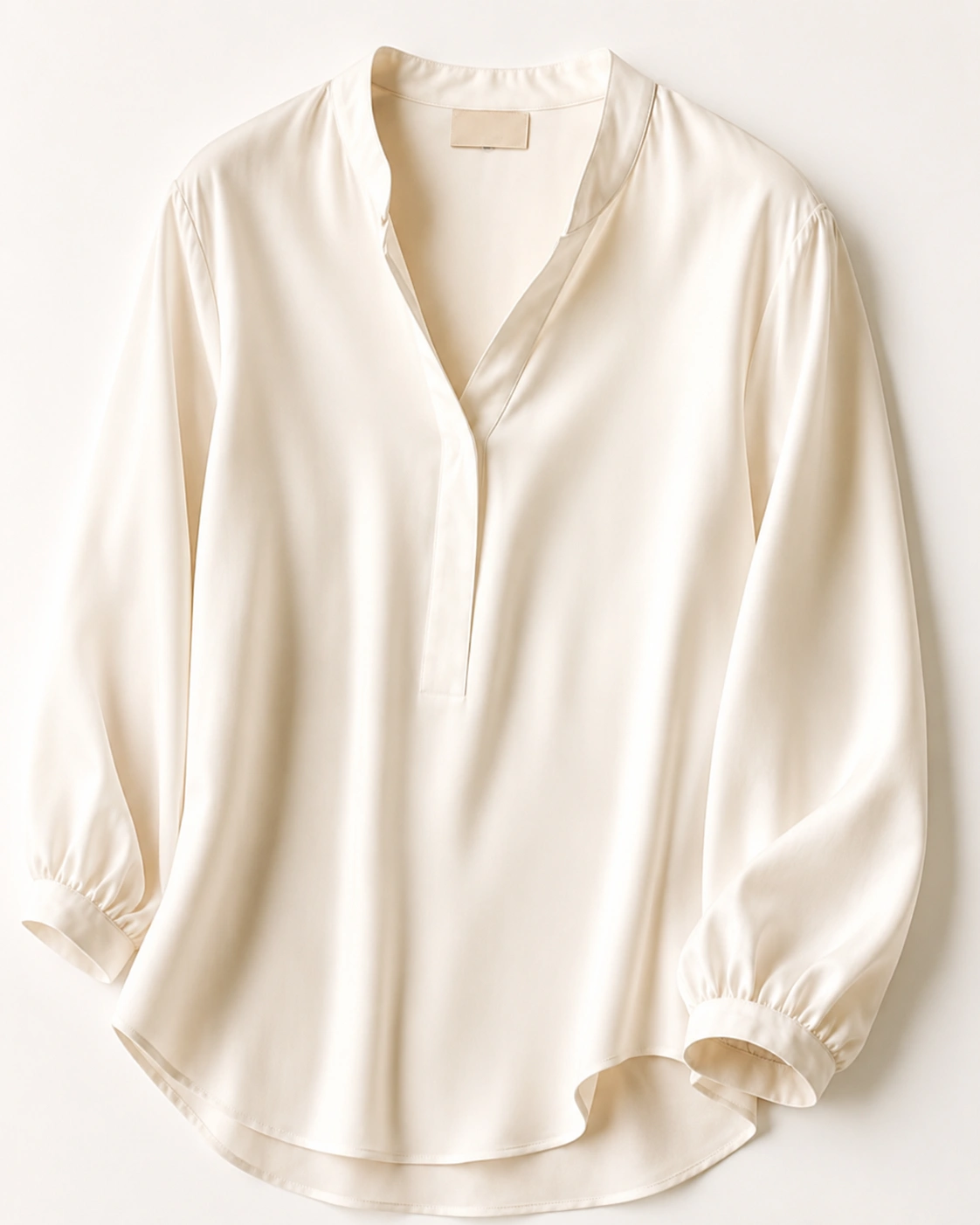 Blouse product on a styled editorial background